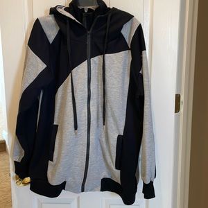 Double zip up hooded mens jacket.